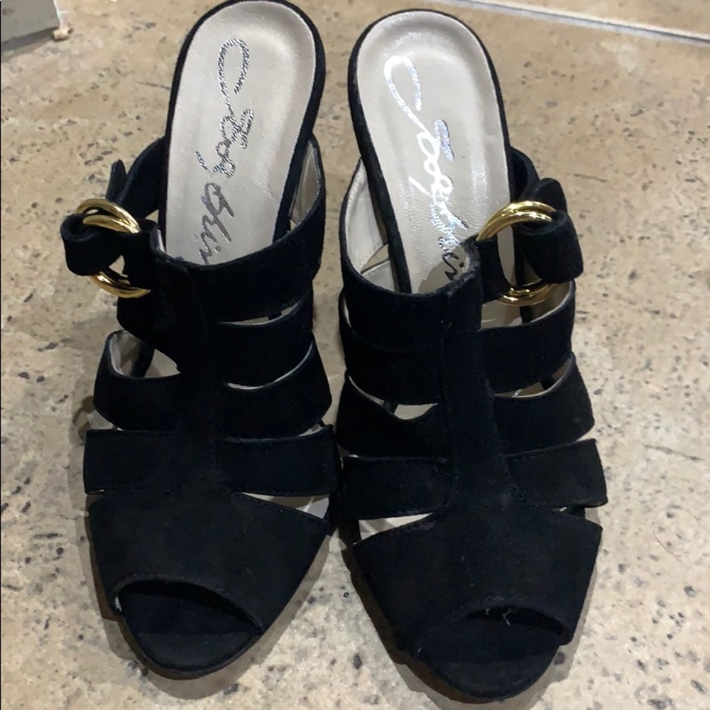 Black suede material pumps with gold buckle!